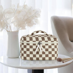 Prite quilted makeup bag close-up showing plush texture and durability