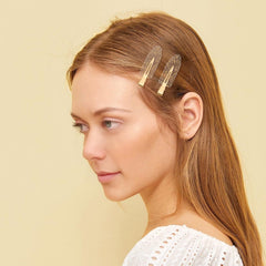 Psyqtsuary resin and stainless steel clip gold finish for a seamless hold