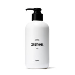 Public Goods conditioner bottle front highlighting hydration-ready design for daily use.
