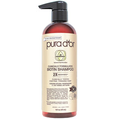 PURA D'OR Biotin Shampoo bottle with organic formula for thicker-looking, healthier hair.