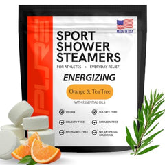 Pure Athlete energizing shower steamer closeup highlighting orange-tea-tree tablet for refreshing morning ritual.