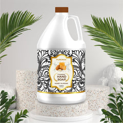 Close-up texture of Puremax Honey Almond foaming hand soap showing creamy foam.