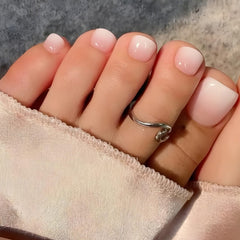 Puyokinm nude press-on toenails package with 24 pieces and tools for DIY pedicures