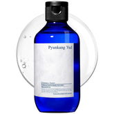 Pyunkang Yul Essence Toner bottle close-up showing hydration-ready formula.