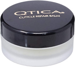 QTICA Intense Cuticle Repair Balm bottle closeup for deep hydration of dry cuticles.