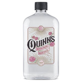 Quinn's Alcohol Free Witch Hazel bottle on vanity with rose scent for gentle cleansing.