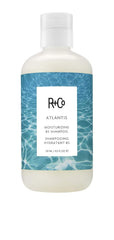 R+Co ATLANTIS bottle with pump emphasizes hydration for shiny hair.