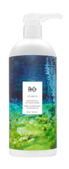 R+Co Atlantis conditioner bottle showing deep hydration for dry hair