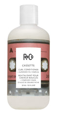R+Co Cassette bottle pump demonstrates moisturizing curl definition for daily care