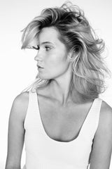 R+Co Dallas root-volume spray highlights boosted volume at the roots