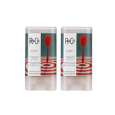 R+Co Dart Pomade Stick hair-smoothing close-up for sleek results.