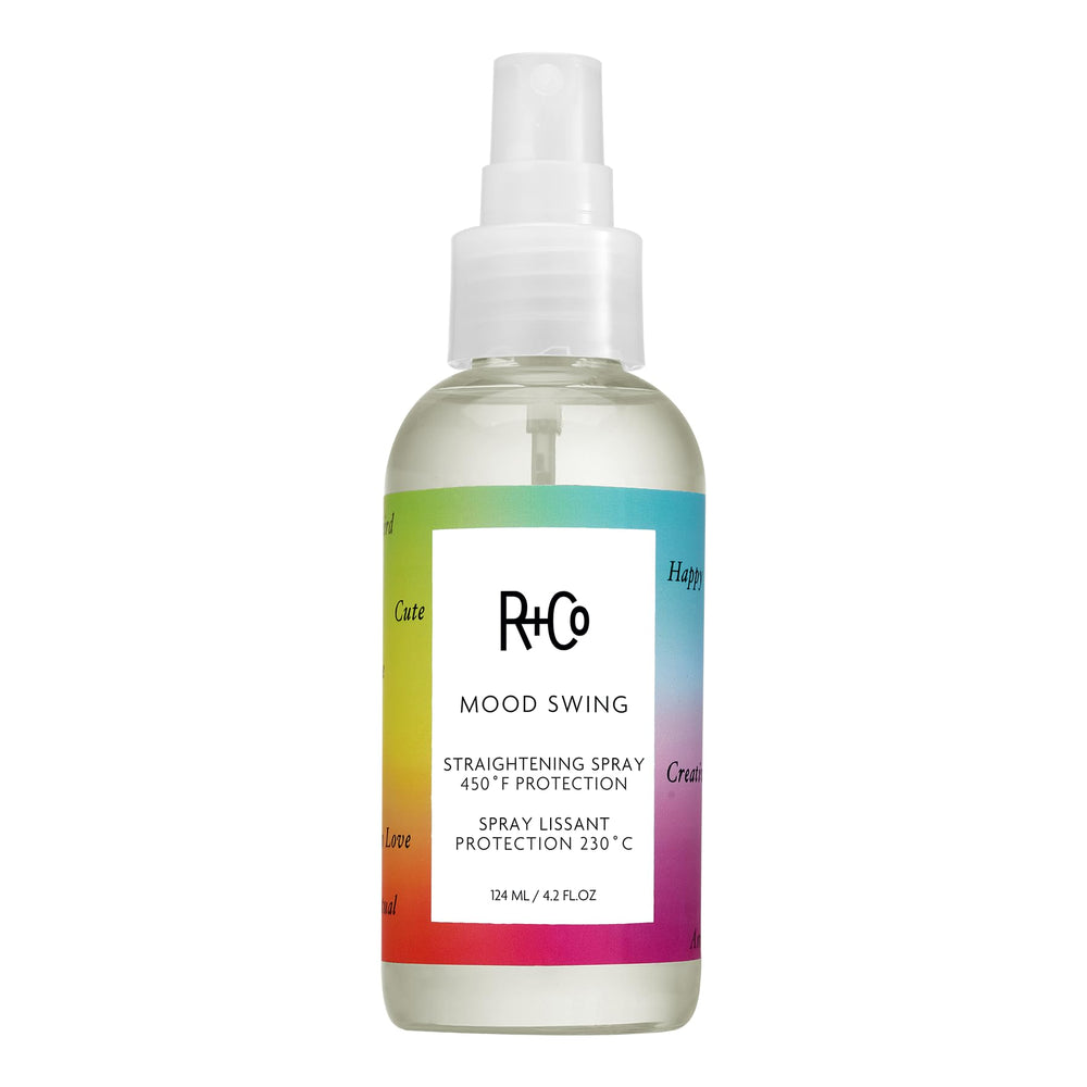 R+Co Mood Swing spray bottle demonstrates humidity defense for smooth blowouts.