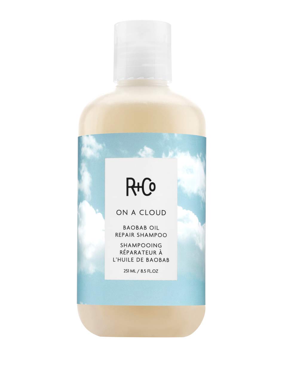 R+Co On A Cloud Baobab Repair Shampoo bottle for gentle, damage-focused cleansing.
