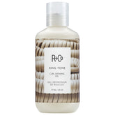R+Co Ring Tone bottle pour demonstrates humidity resistance for defined curls