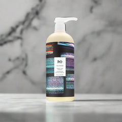 R+Co Television Perfect Hair Shampoo outer packaging on display.