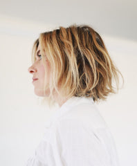 R+Co Zig Zag Root Teasing Spray applied to roots for added volume.