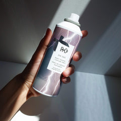 R+Co Zig Zag Root Teasing Spray texture closeup shows even distribution for natural texture.