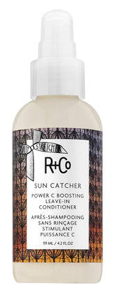 R+Co Sun Catcher Leave-In bottle pour for quick frizz control