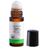 RAJOSEE castor oil roll-on in glass bottle for precise application on skin and nails.