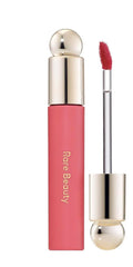 Rare Beauty Soft Pinch Tinted Lip Oil Happy delivers a comfortable glossy tint for all-day wear.