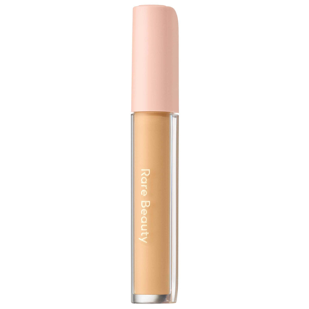 Rare Beauty under-eye brightener cream packaging shows travel-friendly 4ml size for on-the-go touch-ups