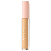 Rare Beauty under-eye brightener cream packaging shows travel-friendly 4ml size for on-the-go touch-ups