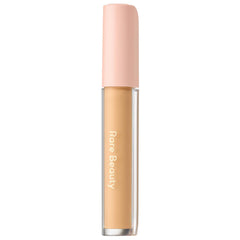 Rare Beauty under-eye brightener cream packaging shows travel-friendly 4ml size for on-the-go touch-ups
