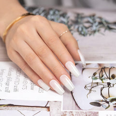 RARJSM french manicure on nails with soft white glow