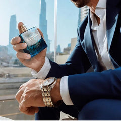 RAYHAAN Pacific for Men bottle-pour-shot captures vibrant citrus opening.
