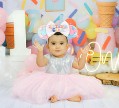 RAZKO close-up shows sequin ears and bow on durable flexible headband