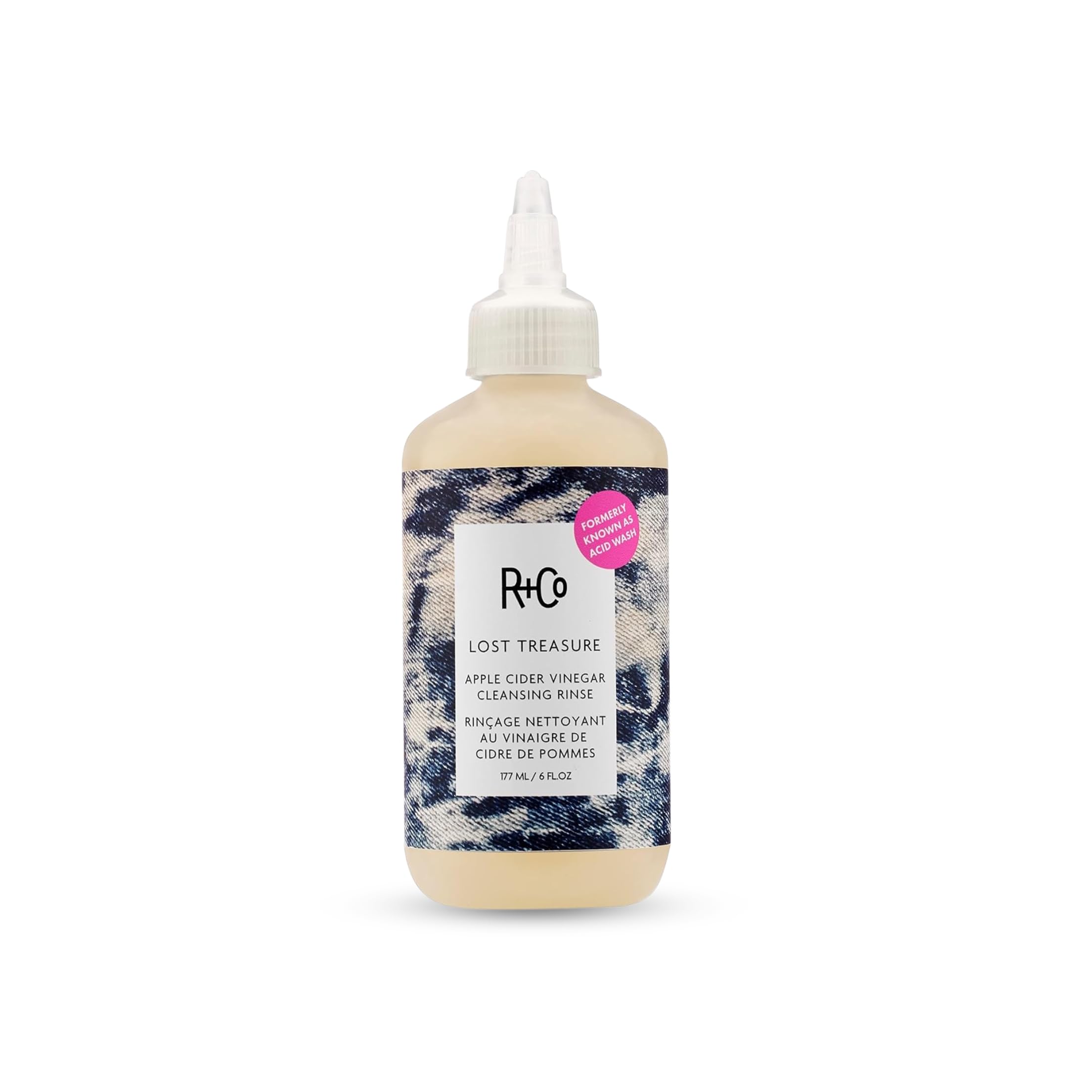 R+Co bottle front view showing product and clean packaging benefit
