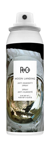 R+Co Moon Landing anti-humidity spray bottle showcases sleek design for frizz control.