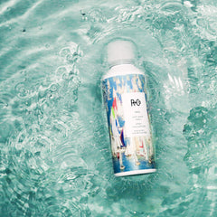 R+Co Sail Soft Wave Spray hair flow captures natural volume and sheen.