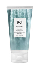R+Co Waterfall Lotion bottle showcasing hydration for shiny hair.