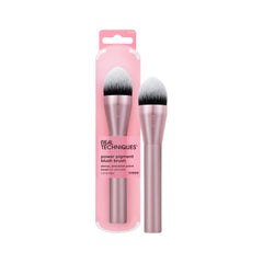 Real Techniques Power Pigment blush brush with pointed head for precise cheek application.