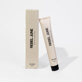 REBEL JUNE The Balm tattoo-aftercare tube applied for deep hydration.