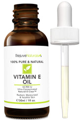 RejuveNaturals Vitamin E Oil bottle shows plant-based hydration for skin.