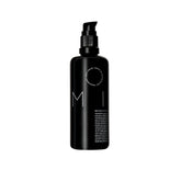 REVERIE Natural Milk Leave-In bottle pour for frizz control and lightweight hydration.