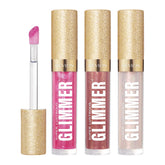 REVLON Glimmer Gloss Rose Glow bottle with plant-based glitter for luminous day-to-night shine.