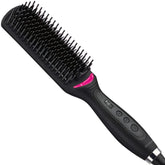 Revlon Salon One-Step brush close-up shows a ceramic-coated surface for smooth, glossy results.
