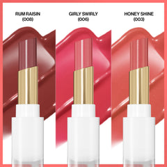 REVLON Glass Shine Balm Rum Raisin swatch demonstrates bold glossy tint with moisturizing comfort.
