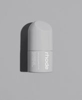 Rhode Hailey Bieber peptide glazing fluid bottle closeup reveals radiant hydration