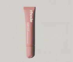 Rhode Lip Tint Toast Rose Taupe bottle offers buildable sheer color and hydrating glossy finish.