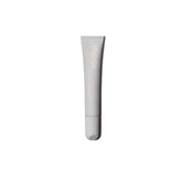 Rhode Salted Carmel Lip Treatment bottle closeup emphasizes glossy hydration.