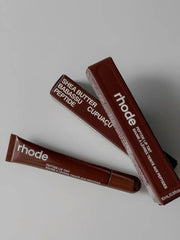 Rhode peptide lip tint espresso brown swatch with sheer color and glossy finish