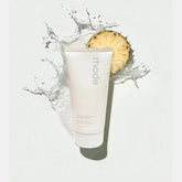Rhode Pineapple Refresh Daily Cleanser bottle demonstrates gentle cleansing for sensitive skin.