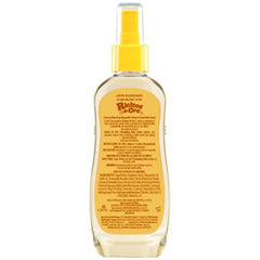 Ricitos de Oro Clarifying Lotion Chamomile Goldilocks 125 ml swatch on hair highlights natural tone.