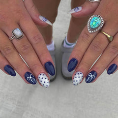 RIICFDD press-on nails short almond in dark blue with dots and bow for chic party nails