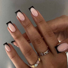 RikView French Tip press-on nails on hand for quick salon-like manicure at home