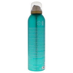 RITUALS Ritual of Karma bottle with foam displays the gel-to-foam transition for a refreshing cleanse.